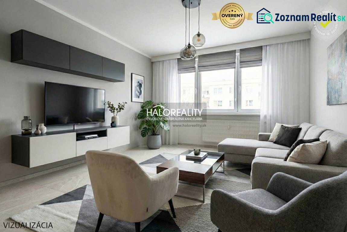 Wohnzimmer in einer 3-Zimmer-Wohnung mit großem Sofa, Fernseher, Teppich, Holzboden.