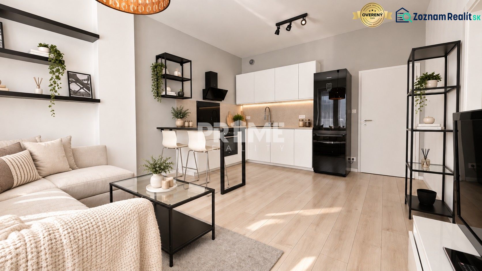 Eine stilvolle 2-Zimmer-Wohnung mit Holzboden und moderner Küche.