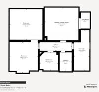 Grundriss eines Einfamilienhauses mit Küche, Schlafzimmern und Wohnbereich.