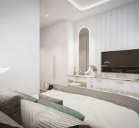 Helles Schlafzimmer mit Bett und Spiegel in einer 3-Zimmer-Wohnung, Fernseher an der Wand.