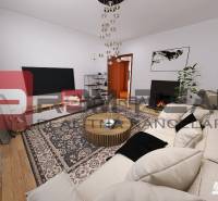 Wohnzimmer in einer 3-Zimmer-Wohnung mit Sofa, Fernseher, Teppich und Gitarre in der Ecke.