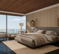 Ein Schlafzimmer in einem Einfamilienhaus mit großen Fenstern, einer Holzdecke und eleganten Möbeln.