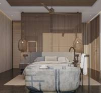Ein luxuriöses Schlafzimmer in einem Einfamilienhaus mit Designerleuchten, Holzelementen und einem bequemen Bett.