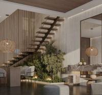 Innenraum eines Einfamilienhauses mit Treppe, Esstisch und Designerleuchten.