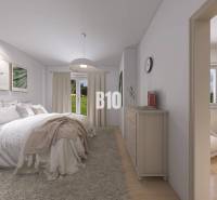 Helles Schlafzimmer mit großem Bett, Vorhängen und Schrank in einem Einfamilienhaus.