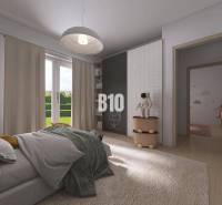 Kinderzimmer mit Bett, Dekorationen und Zugang zum Garten in einem Einfamilienhaus.