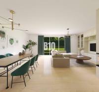 Wohnzimmer und Esszimmer in einem Einfamilienhaus mit Kamin und großem Tisch.