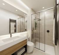 Ein stilvolles Badezimmer in einer 3-Zimmer-Wohnung mit einer Dusche und einem Waschbecken.