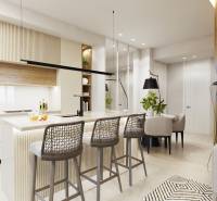 Küche mit Esstisch und Bartresen in einer 3-Zimmer-Wohnung.