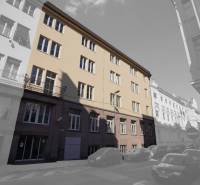 Das Gebäude in der Gunduličova-Straße in Bratislava - Altstadt, umgeben von Autos in einer Reihenbebauung.