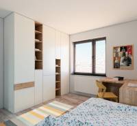 Kinderzimmer im Einfamilienhaus mit Aufbewahrungsschränken und Schreibtisch.