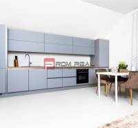 Küche in einer 3-Zimmer-Wohnung mit modernen Möbeln und einem Esstisch mit drei Stühlen.