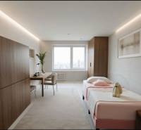 Schlafzimmer in einer 3-Zimmer-Wohnung mit Bett, Schreibtisch und Bodenbelag in Holzoptik.