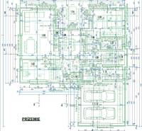 Grundriss des Erdgeschosses eines Einfamilienhauses, bestehend aus Garage, Wohnzimmer und Küche.