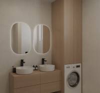 Badezimmer mit Holzmöbeln und zwei Waschbecken, Waschmaschine zum Wäschewaschen.