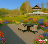 Die Terrasse eines Einfamilienhauses in Štiavnické Bane mit Blumengarten und Gartenmöbeln.