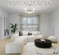 Wohnzimmer in einem Einfamilienhaus mit Holzboden, hellen Möbeln und einem runden Tisch.