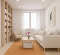 Ein stilvolles Wohnzimmer mit Regalen und einem Holzboden in einer Vierzimmerwohnung.