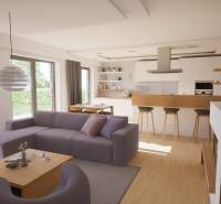 Wohnzimmer mit Holzboden und Kücheninsel in einem Einfamilienhaus.