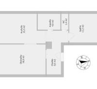Grundriss einer 2-Zimmer-Wohnung mit Schlafzimmer, Wohnzimmer, Küche, Badezimmer und WC.