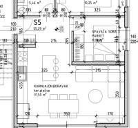 Grundriss einer Ferienwohnung mit zwei Schlafzimmern, einem Badezimmer und einem geräumigen Wohnbereich.