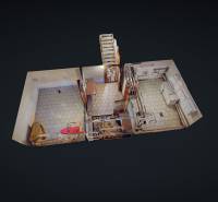 Innenraum eines Einfamilienhauses mit gefliestem Boden, Küche und Treppe.