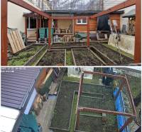 Garten bei einem Einfamilienhaus in der Laborecká-Straße in Spišská Nová Ves mit einem Blumenbeet.