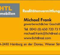 Visitenkarte für Immobilien- und Einfamilienhäuser mit Kontakt zu Michael Frank.