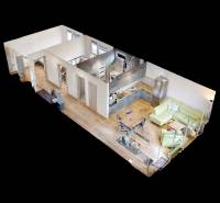 Grundriss einer 3-Zimmer-Wohnung mit Holzboden, Küche und Wohnbereich.