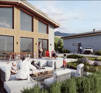 Ein Ferienhaus in Dolná Lehota mit Terrasse und Sitzbereich, umgeben von Natur und moderner Architektur.