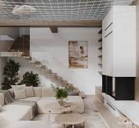 Helles Wohnzimmer in einer Hütte mit bequemer Couchgarnitur und Holzboden.