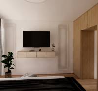 Schlafzimmer in einer 3-Zimmer-Wohnung mit Holzboden und einem großen Fernseher an der Wand.