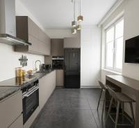 Küche einer 3-Zimmer-Wohnung mit schwarzen Geräten, grauen Schränken und Hängelampen.