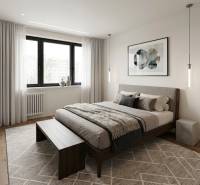 Schlafzimmer mit großem Bett, dekorativem Teppich und Holzboden in einer 3-Zimmer-Wohnung.