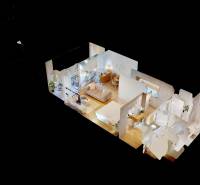 3D-Grundriss einer Einzimmerwohnung mit Holzboden.