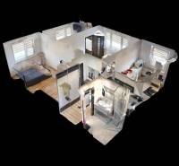 3D Grundriss einer 3-Zimmer-Wohnung mit Holzboden und Einrichtung.