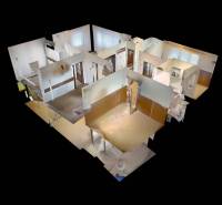3D-Grundriss eines Einfamilienhauses mit Holzboden-Dekor.