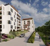 Neubau und Grünfläche in der Suchoňova-Straße in Poprad neben einer 4-Zimmer-Wohnung.
