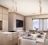 Essbereich mit großem Tisch und hängenden Leuchten in einer 4-Zimmer-Wohnung.