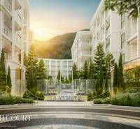 Wohnungsbau in Phuket mit eleganter Architektur und gepflegter Grünanlage im Außenbereich.