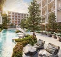 Der Bau von Wohnungen in Phuket mit Pool und Grünflächen schafft eine entspannende Umgebung.