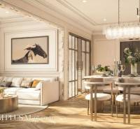 Wohnzimmer einer 3-Zimmer-Wohnung mit Holzboden und elegantem Essbereich.