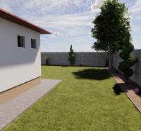 Garten bei einem Einfamilienhaus in Zemianska Olča mit Rasen und Ziersträuchern, umgeben von einem Zaun.