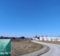 Grundstücke - Wohnen am Sonnensee Nord in Senec, Grasgelände an der Straße.