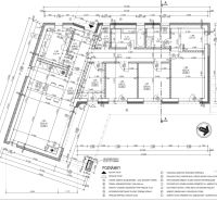 Grundriss eines Einfamilienhauses mit drei Zimmern, Küche und Badezimmer.