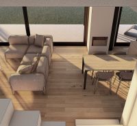 Innenansicht eines Wohnzimmers mit Sofa, Couchtisch und Holzdekorboden.