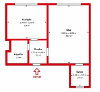 Grundriss einer 2-Zimmer-Wohnung mit Küche, Badezimmer, Flur und Ankleidezimmer.