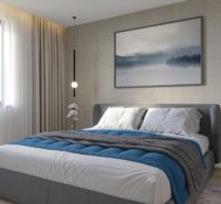 Schlafzimmer in einem Einfamilienhaus mit großem Bett und dekorativer Wand.