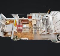 3-Zimmer-Wohnung mit Holzboden, modernen Möbeln und komplett ausgestatteter Küche.