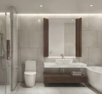 Badezimmer in einer 2-Zimmer-Wohnung mit Badewanne, Dusche und modernem Waschbecken.
